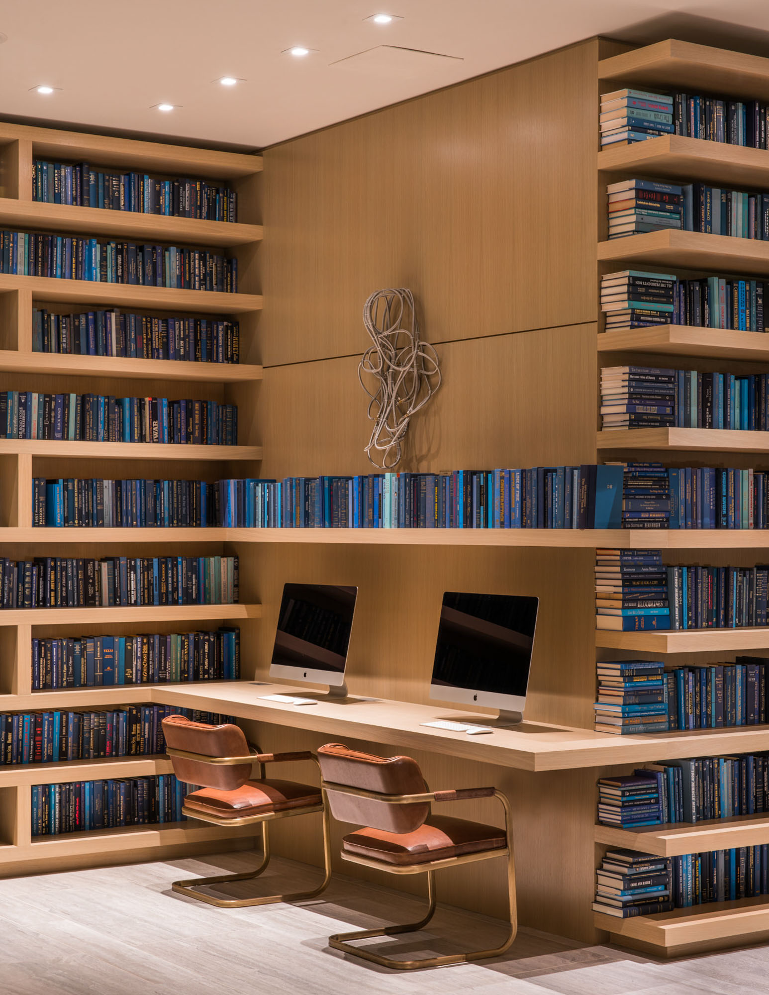 The business center library and computer monitors at the Atelier luxury apartments in downtown LA