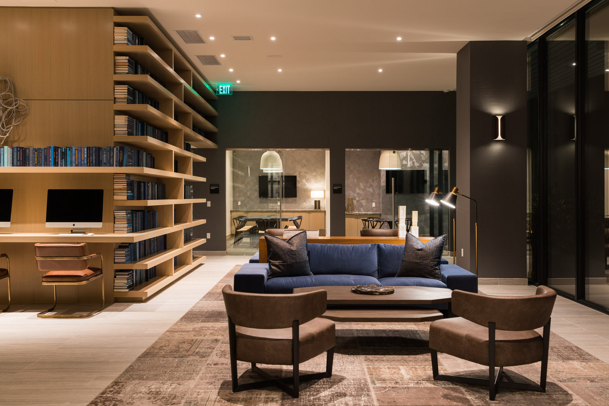 The business center seating area and library at the Atelier luxury apartments in downtown LA