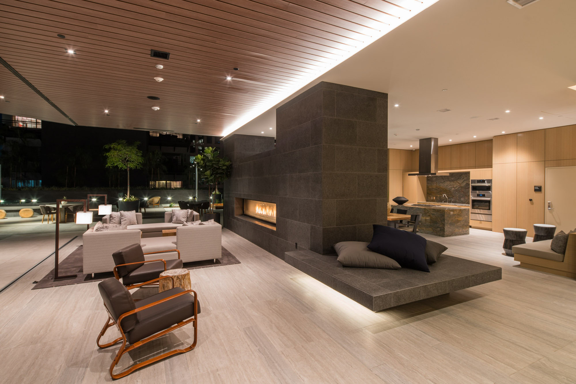 A modern clubroom with ample seating options at Ateliers luxury, high rise apartment in downtown LA