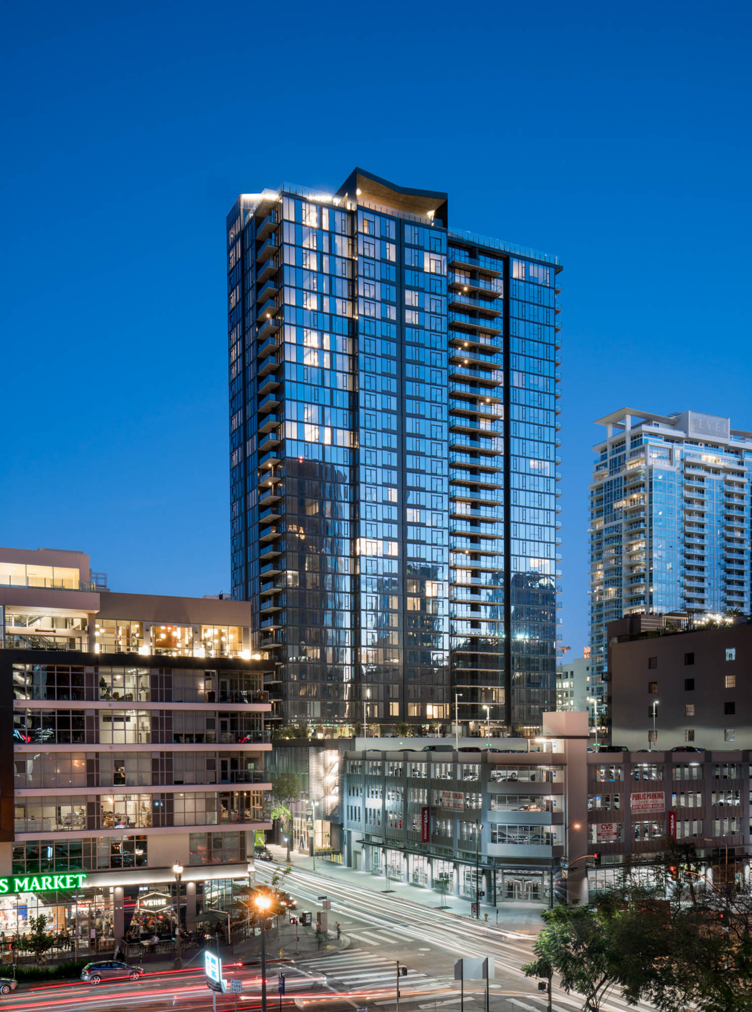 Distant exterior view of the Atelier apartment building in the middle of downtown LA