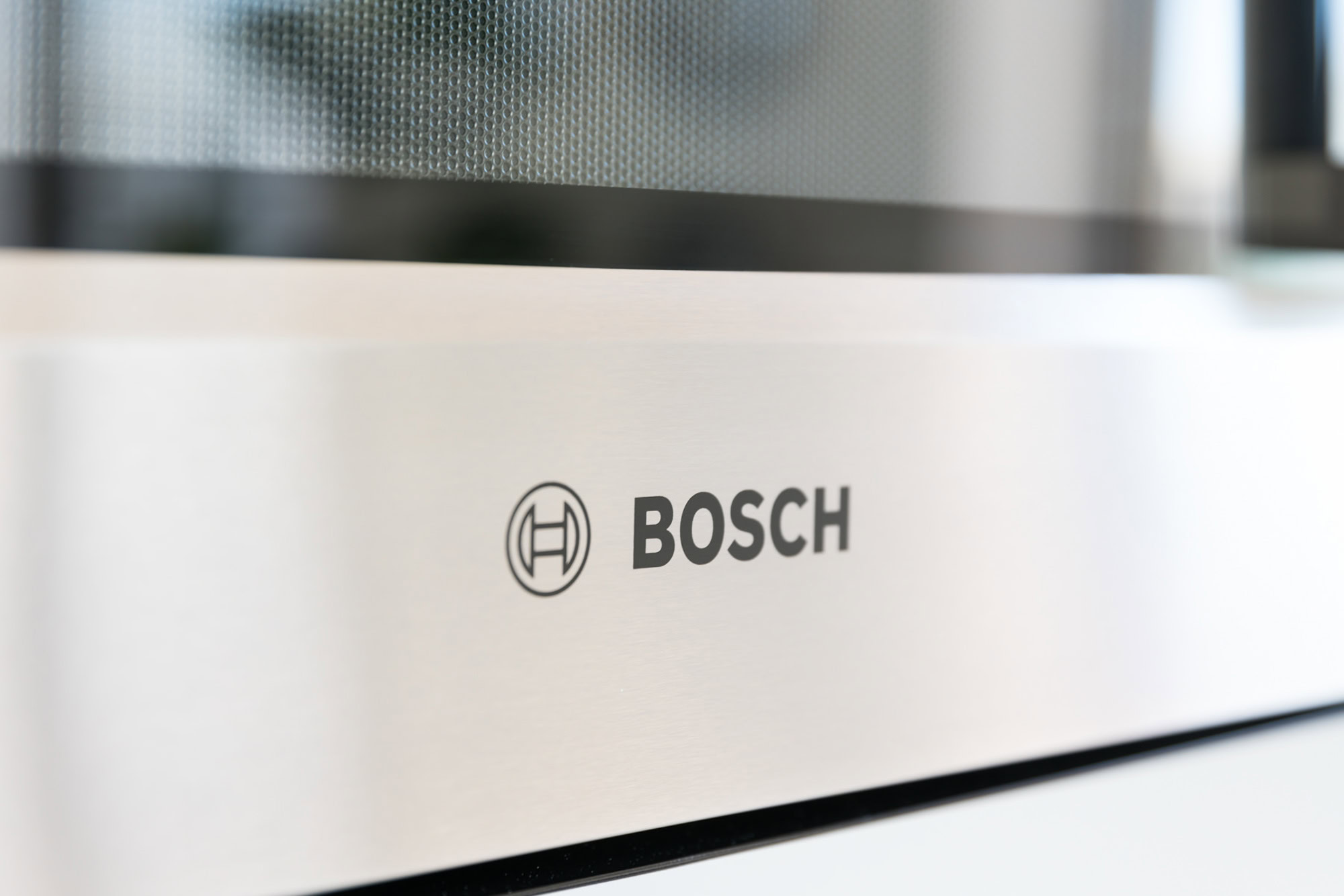 A close up of Ateliers kitchen appliances featuring Bosch stainless steel appliances in Ateliers dtla apartments