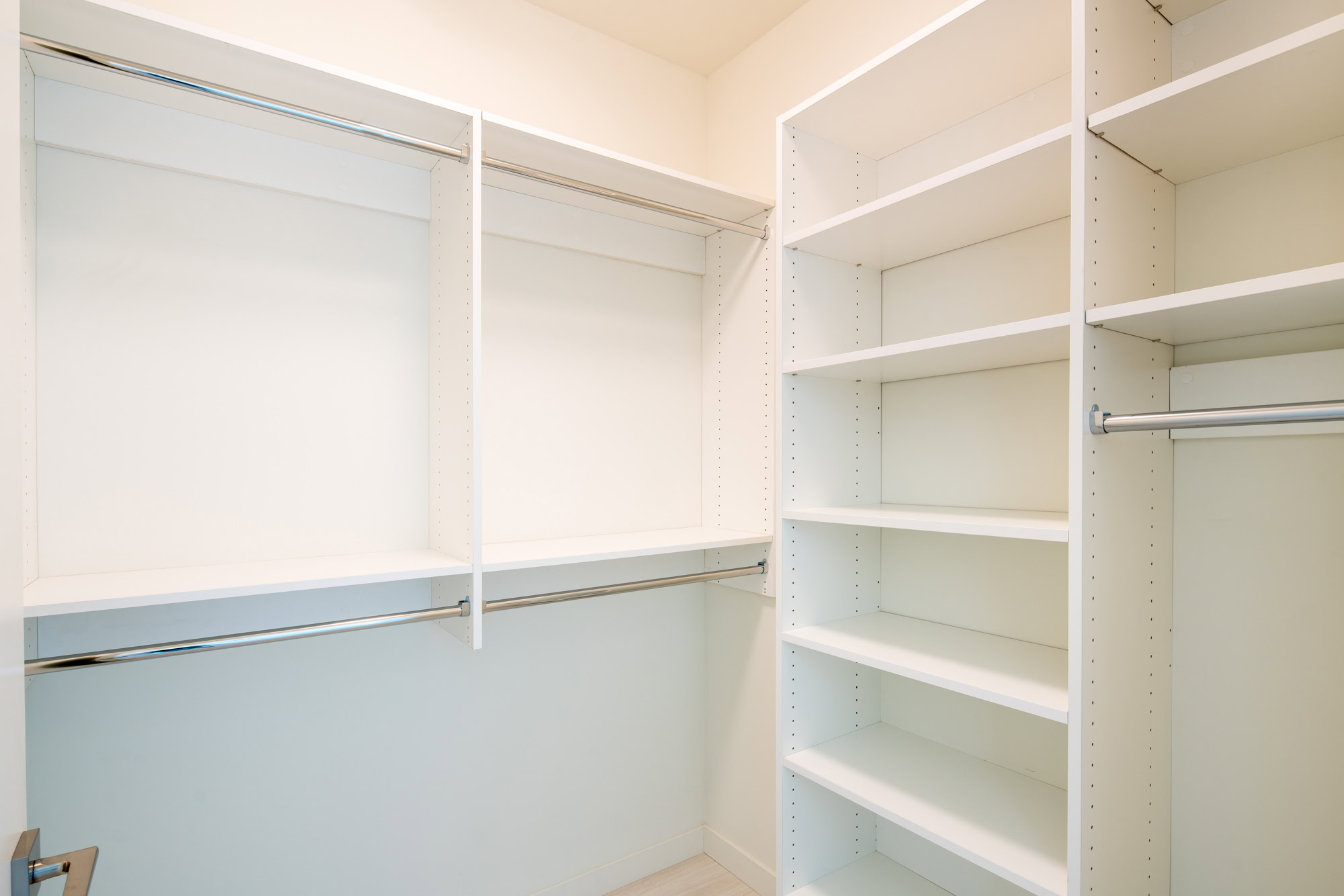 A spacious white close space with storage and shelf space in an Atelier apartment in DTLA
