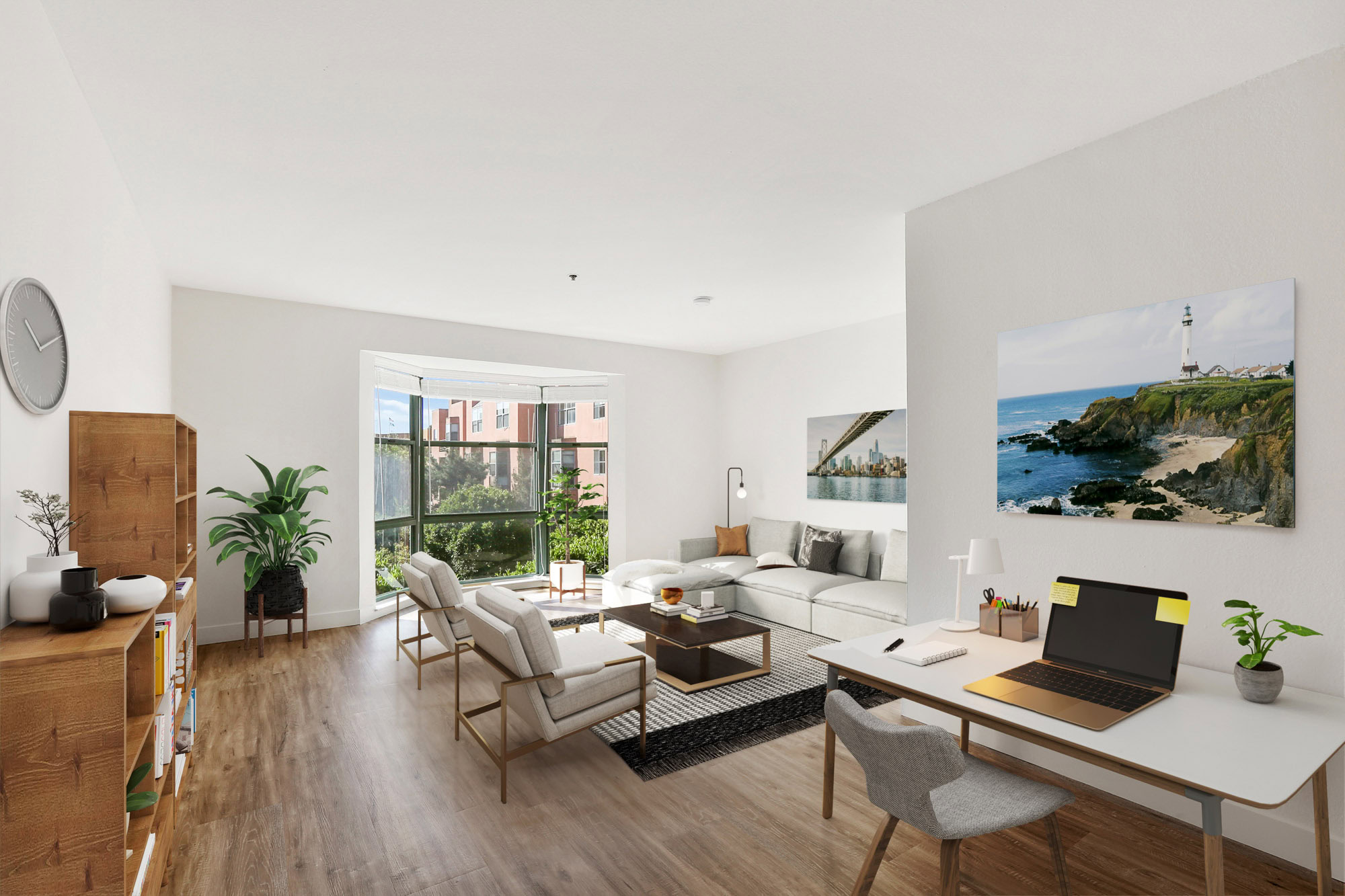 A spacious living room with a large bay window, work space and hardwood flooring at Bayside Village apartments in San Francisco