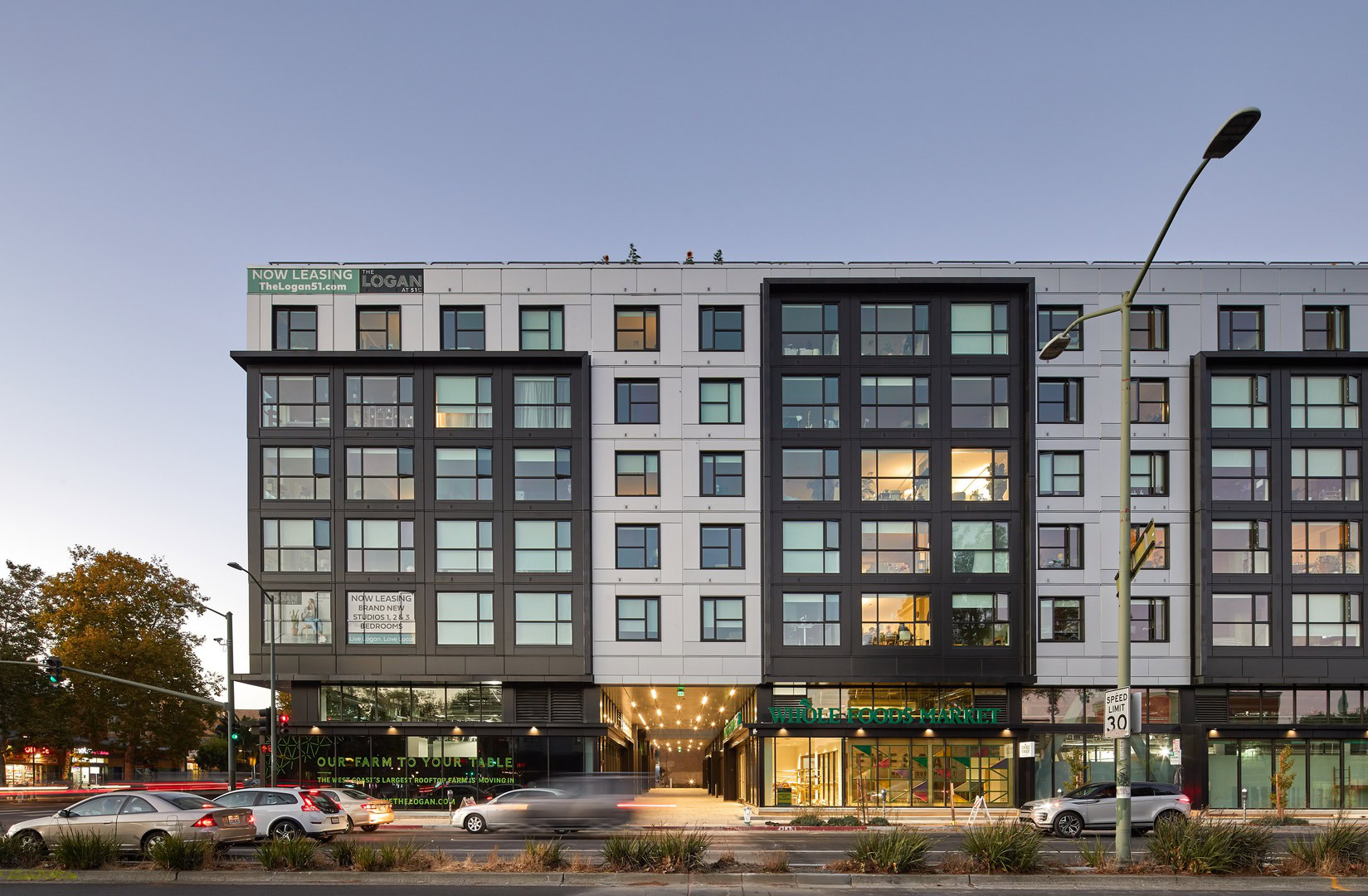 A street level view of The Logans Oakland luxury apartments for rent