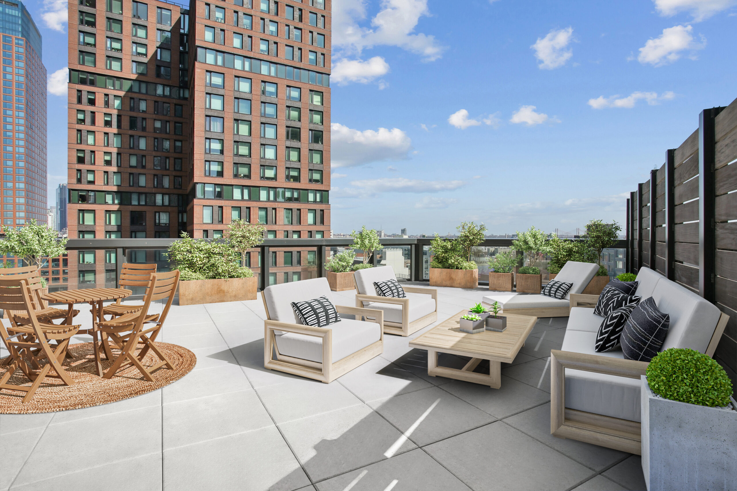 Private outdoor terrace with furniture and city views