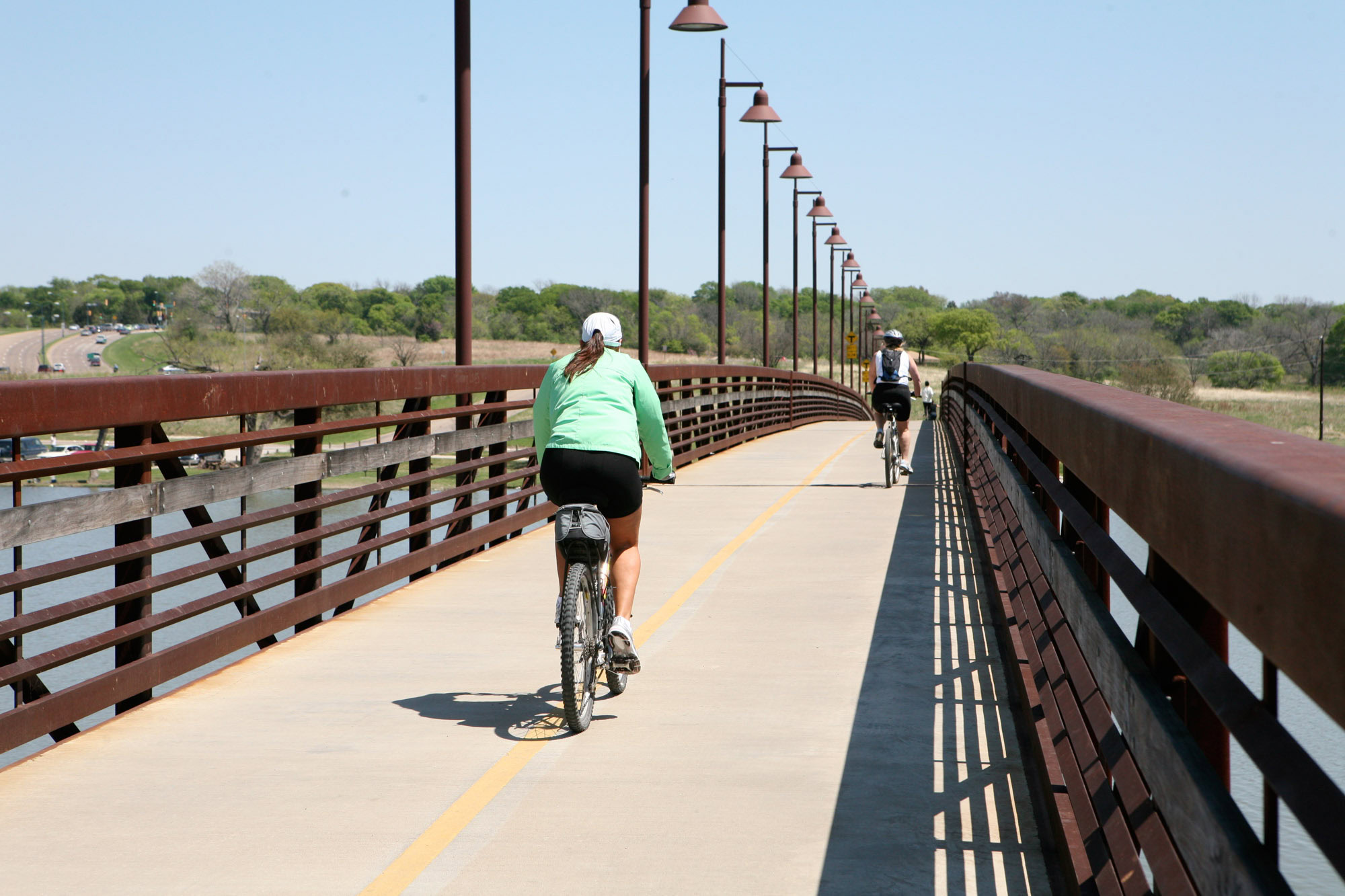 A bike path on a bridge near The Element luxury apartments in Dallas Texas